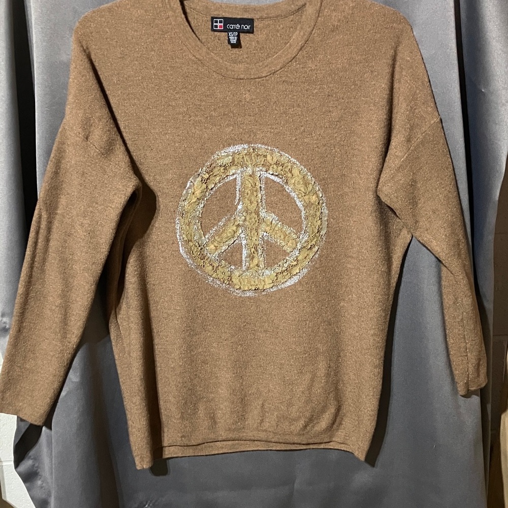 Carrie Noir Tan Peace Symbol Sweater.